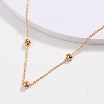 Gold Love Knot Necklace - Hollywood Sensation®